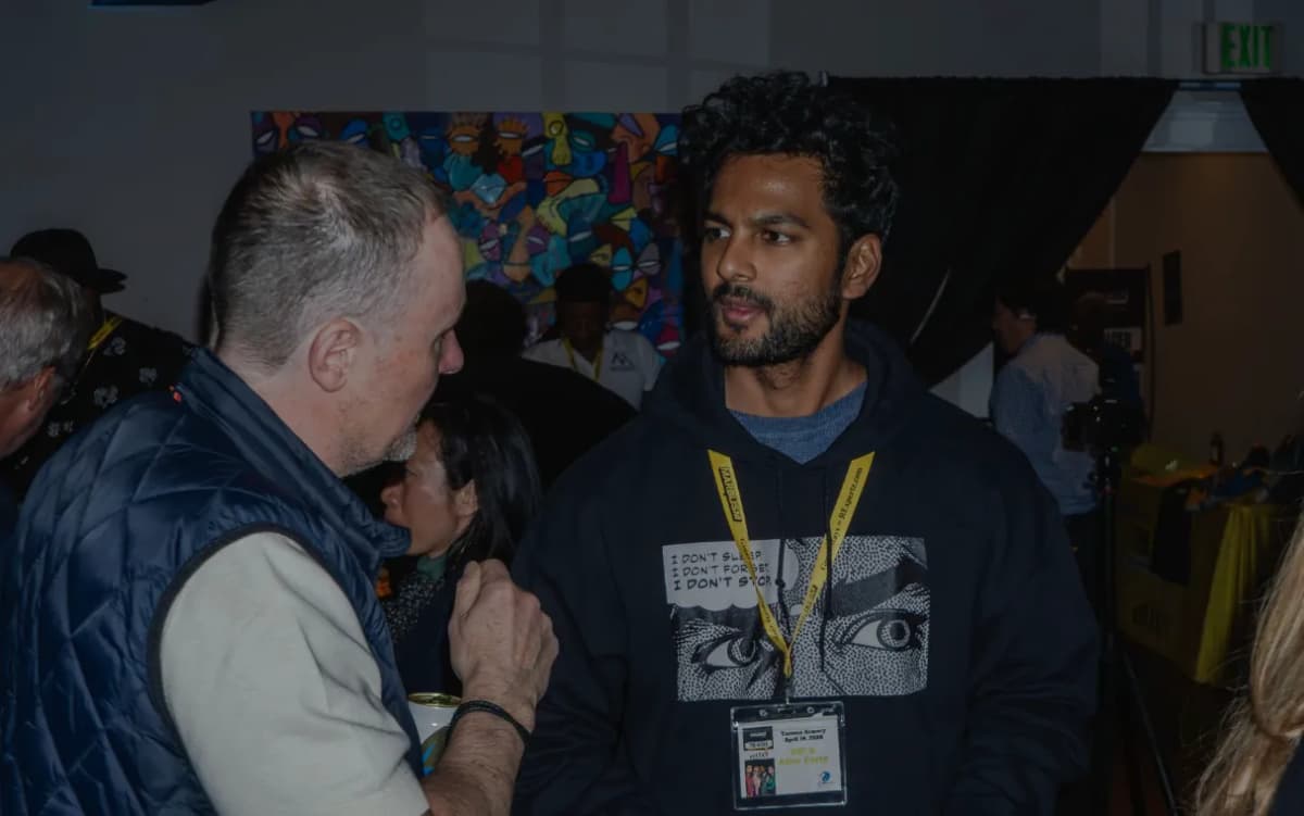 Team networking and laughing at a partner event